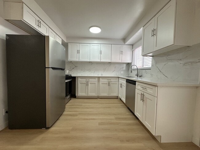 Building Photo - 7825 W Manchester Ave Unit 1a