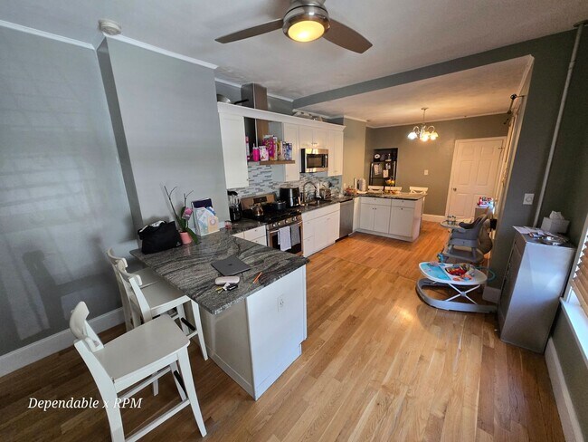 Photo - Spacious Three-Level Boston Rental with Flexible Living Space