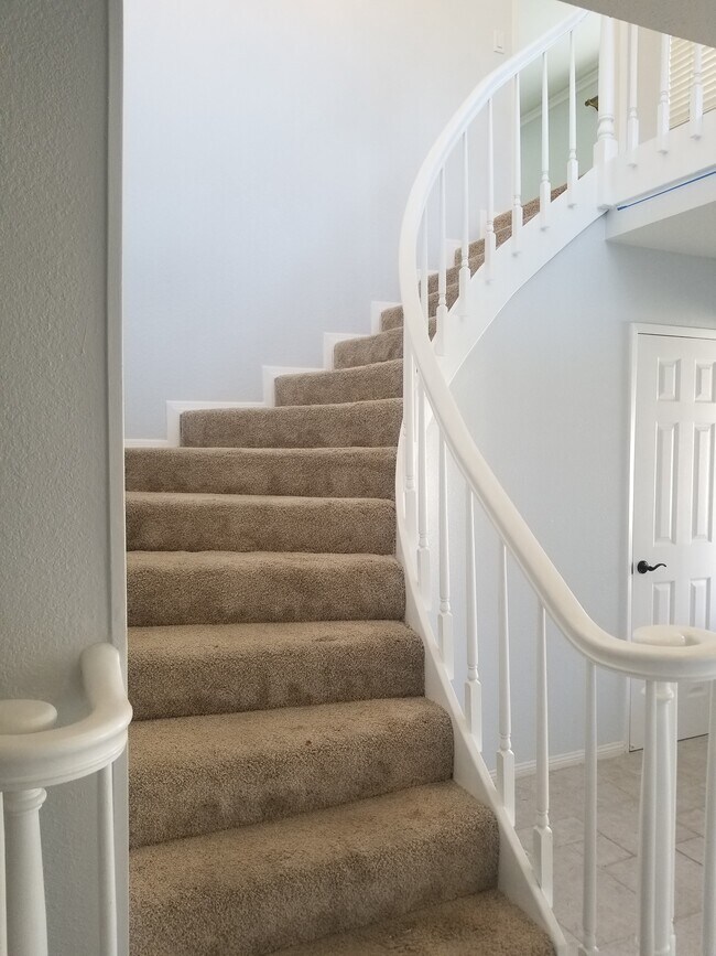 Staircase leading to 2nd master suite - 5269 E Rural Ridge Cir