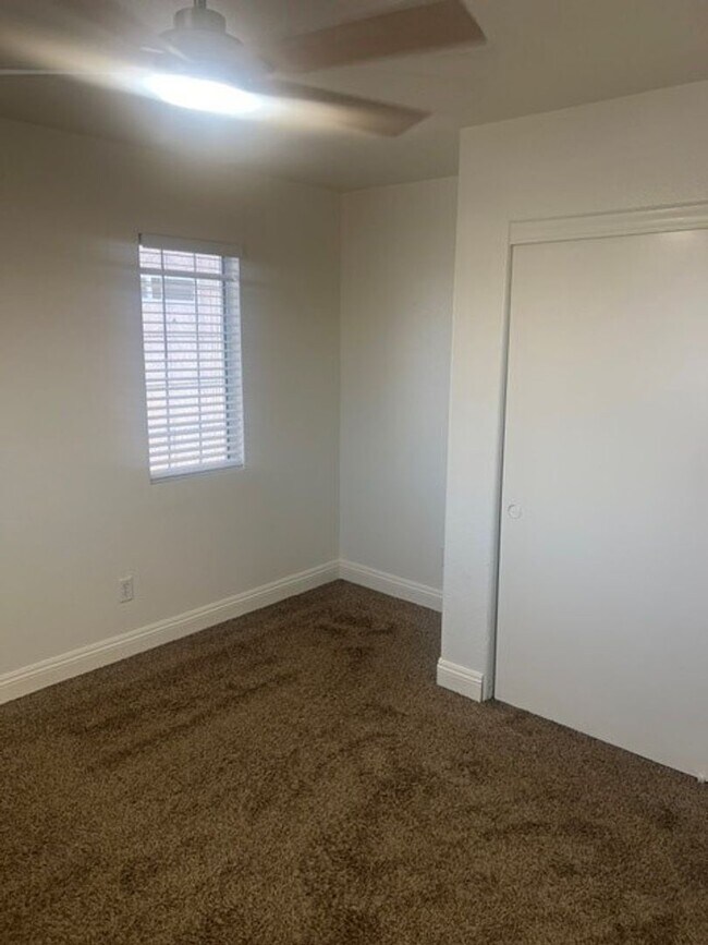 Photo - This three bedroom has the primary bedroom on the downstairs level.