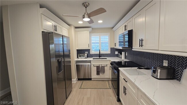 12945 Vanderbilt Dr Unit 402