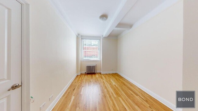 Photo - 25 E 10th St Unit 1A