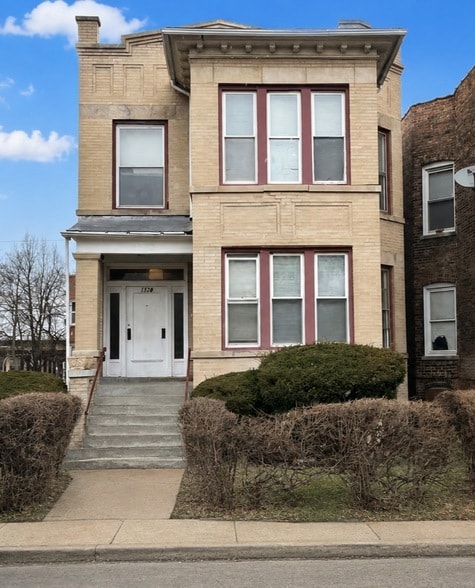 Building Photo - 1320 W 64th St Unit 1