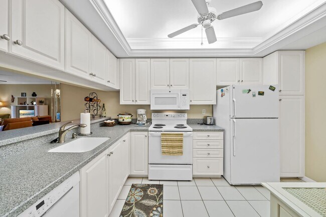 Photo - first-floor unit featuring a 2 bedroom, 2 ...