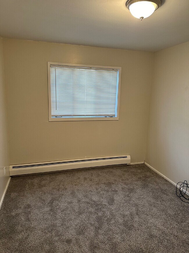 Photo - "Charming 3-Bed, 2-Bath Haven in Aurora – Your Cozy Retreat Awaits!"