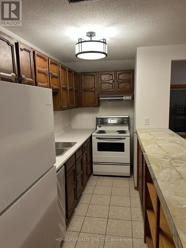 Photo - 1402 Kingston Rd Unité 2nd Flr