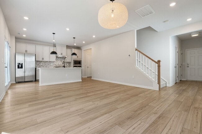 Photo - Move-In Ready 4BR Home | Deck, Patio & Open Concept Living