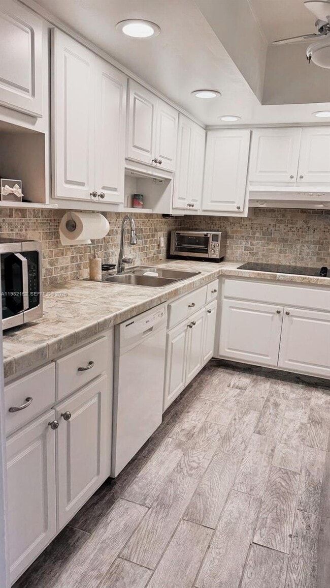 Photo - 400 Kings Point Dr Unit 408