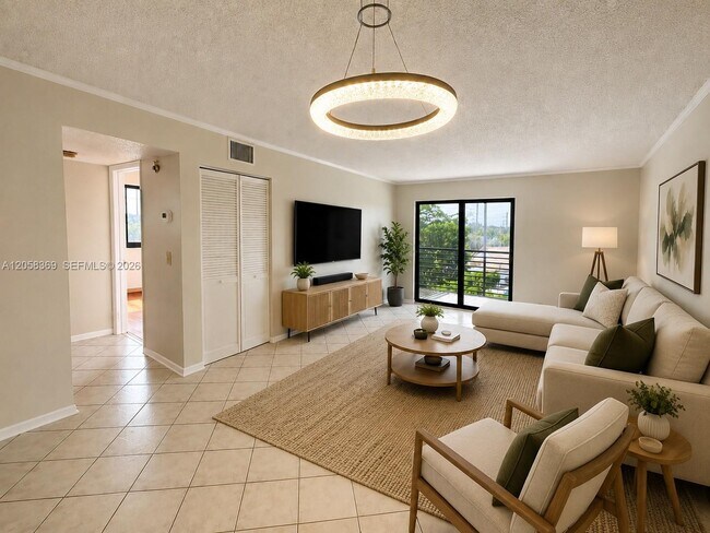 Building Photo - 3700 N Pine Island Rd Unit 402