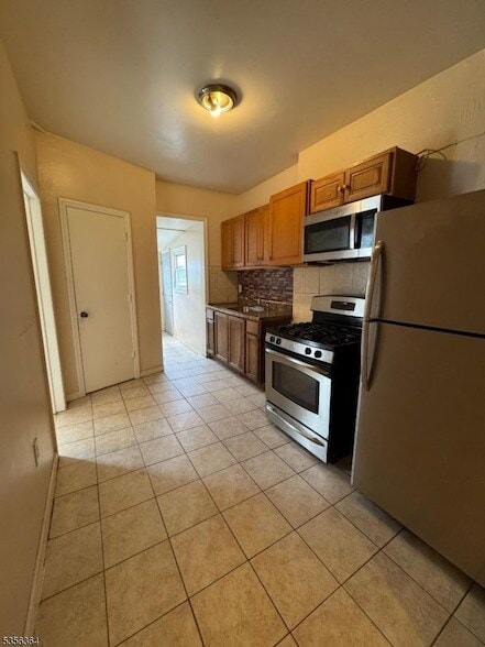 Photo - 712 E 27th St Apartment