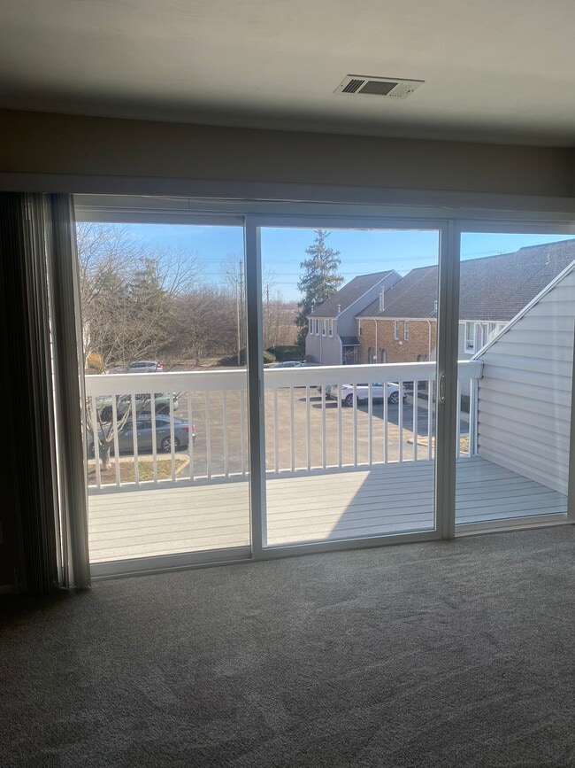 Door to balcony - 105 E Ticonderoga Dr Unit L