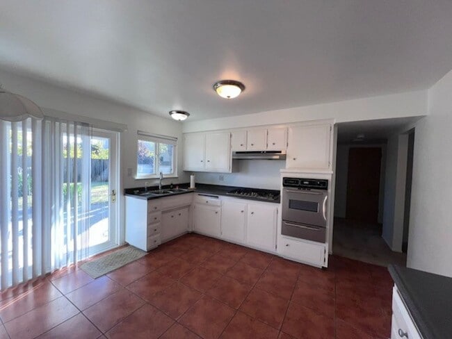 Photo - Freshly painted home with large backyard. ...