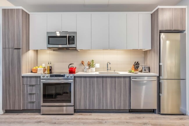 Brand new modern kitchen with stainless steel appliances