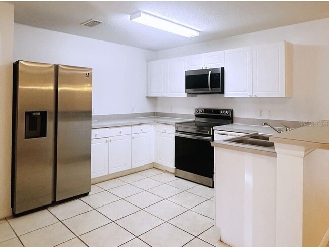 Photo - 2770 Club Cortile Cir Unidad A