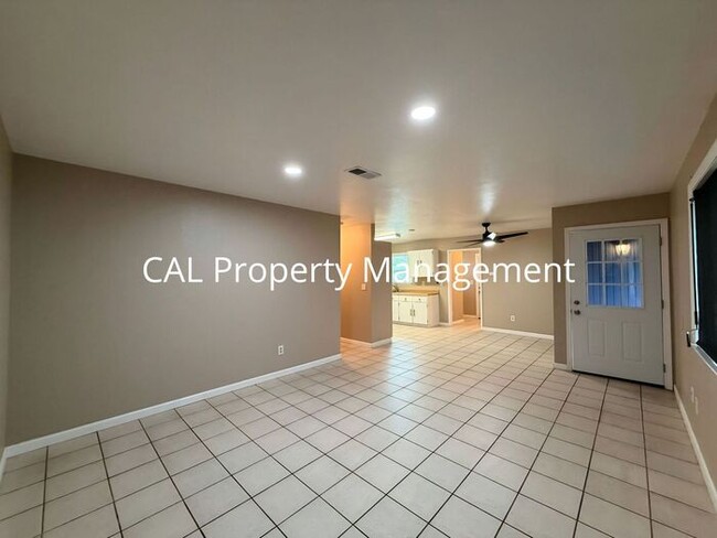 Photo - Spacious 4-Bedroom Home with 2-Car Garage & Backyard Oasis