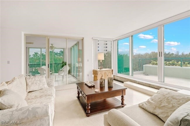 Building Photo - 7515 Pelican Bay Blvd Unit 2A Rental