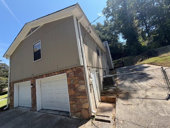 Photo - ACT FAST! 3BR/2BA in Birmingham | Vaulted Ceilings & Fireplace | 2-Car Garage!