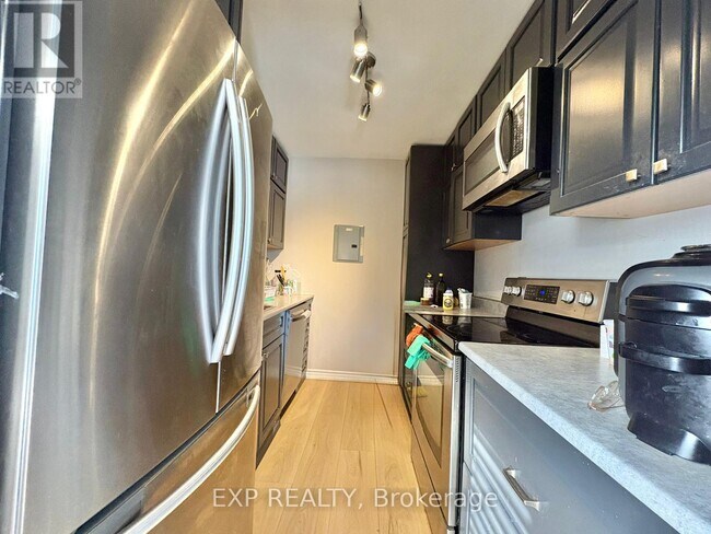 Photo - 25 Paisley Blvd E Unité -6