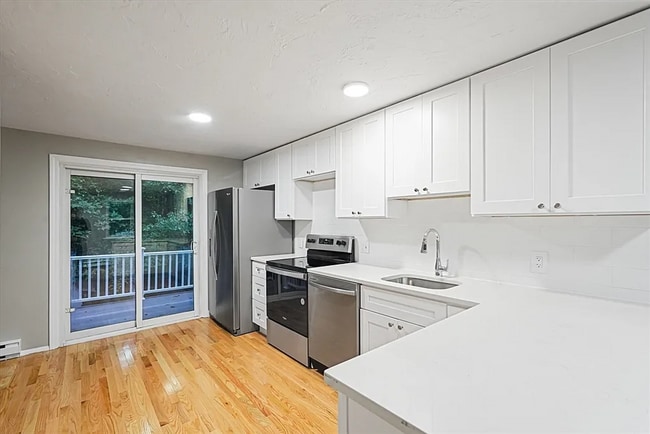 Photo - Modern, Cozy 2BR Home with Basement & Park...
