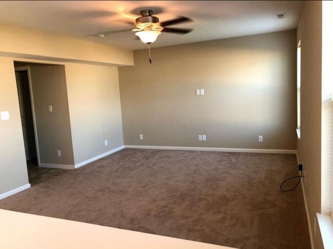 Photo - Spacious 4-Bedroom Home with Loft, Fenced Backyard & Modern Finishes