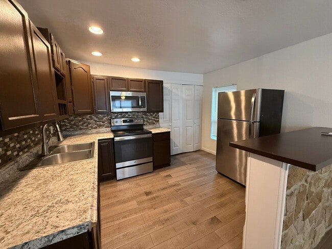 Photo - Updated 3BR w/ Hardwood Floors, Walk-In Shower & Stainless Steel Kitchen