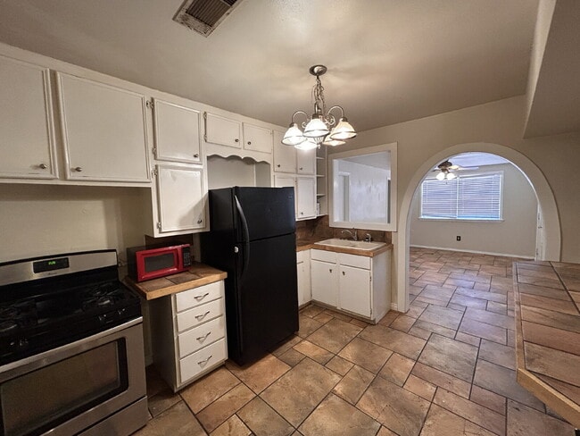 Photo - "Charming 4-Bed, 2-Bath Home
