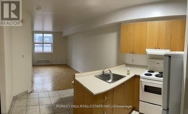 Photo - 126 Dundas St E Unité 202