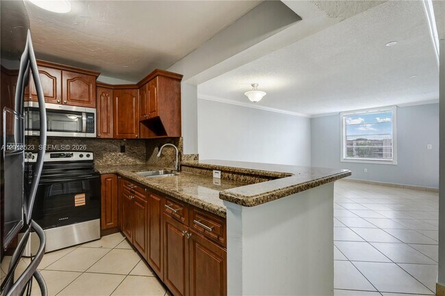 Photo - 5775 W 20th Ave Unit 404