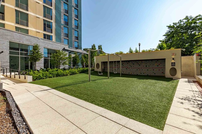 Wholey Legacy Homes - Playground, Rock Climbing Wall, and Building Exterior
