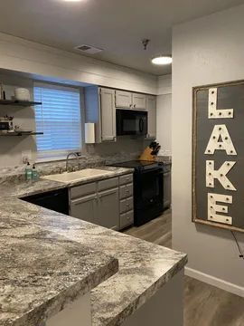 Building Photo - Fully furnished water front condos - BOAT SLIP INCLUDED Unit C-4