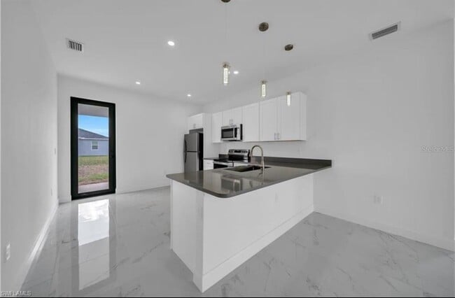 Photo - 4646 Leonard Blvd S