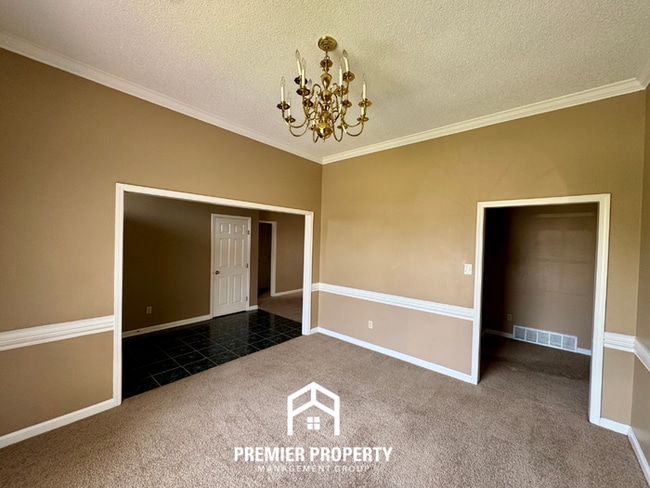 Photo - Spacious 3BR/2BA Near Southwind | 1,958 Sq Ft, Brick Fireplace, 2-Car Garage & Quiet Cove