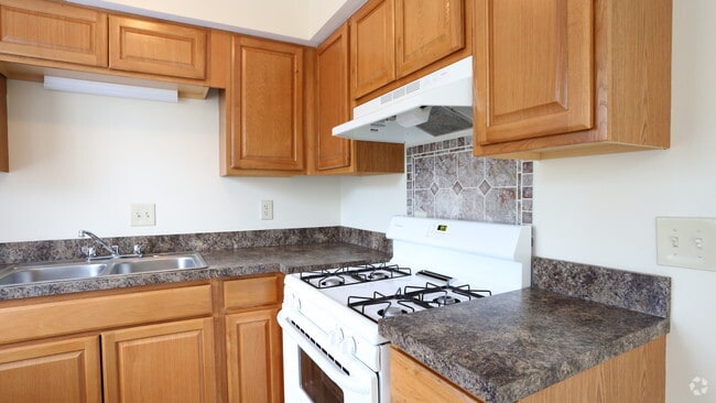 Kitchen - renovated 2BR, 1.5BA - 896 SF - Raintree Apartment Townhouses