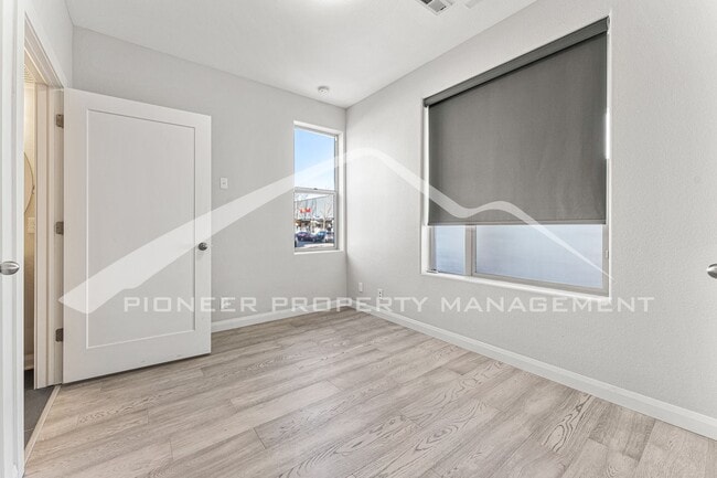 Photo - Beautiful Townhome with Central A/C and Two Car Garage!