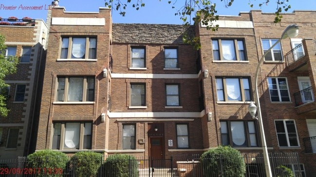 Building Photo - 4749 S Langley Ave Unit 2