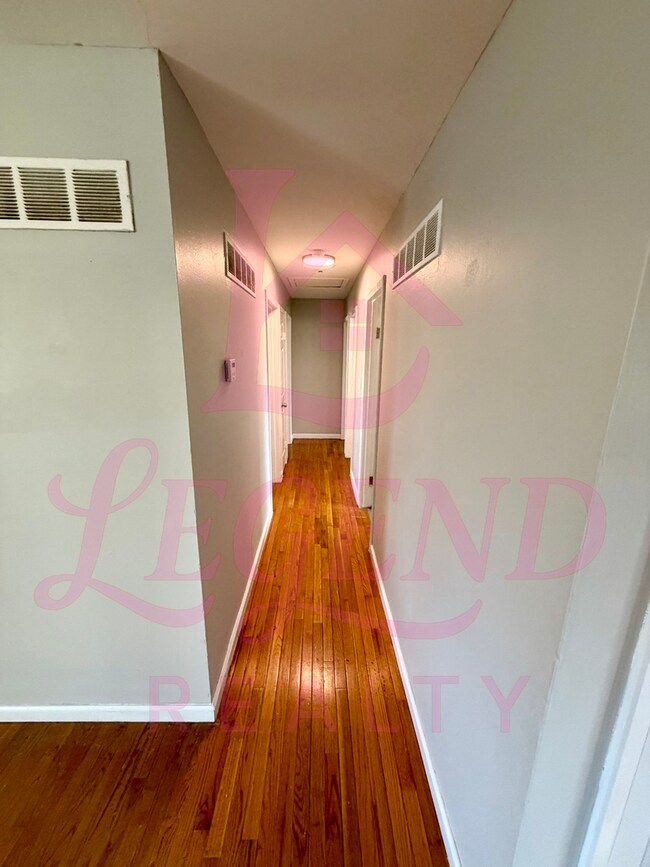 Photo - Spacious 4-Bedroom Home with Private Primary Suite & Hardwood Floors!