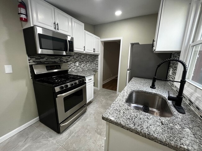 Building Photo - Renovated 2-Bedroom Home with Updated Kitchen & Backyard – Trenton NJ