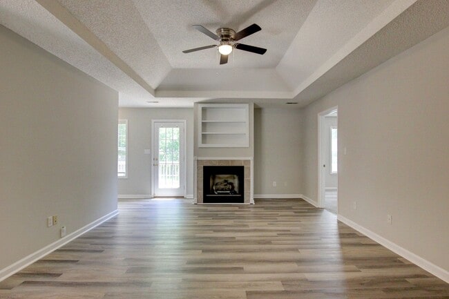 Photo - Stunning Brick Front Home With Fireplace And Hardwood Flooring In Sango Area