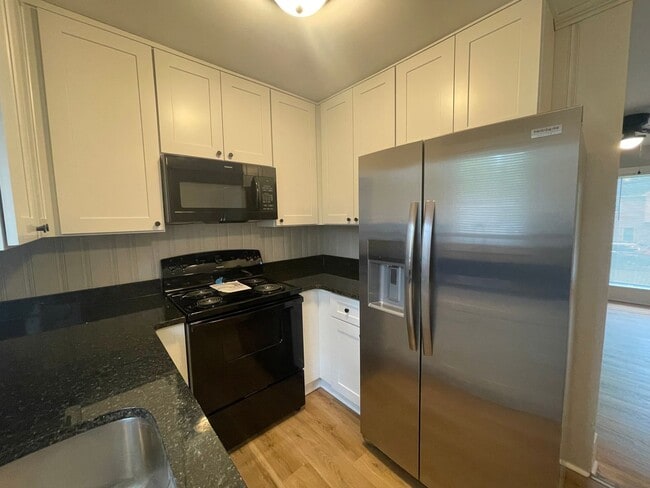 Photo - Welcome to Burgess2937, A Newly renovated charming 2-bedroom, 1-bathroom Duplex located in the vi...