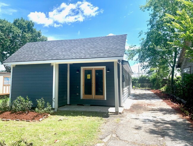 Front Exterior with Driveway - 1104 1st St Casa