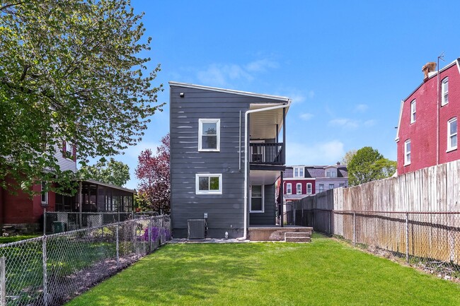 Photo - Bright & Fully Renovated 3BR Home with Backyard, Bonus Attic Space & Modern Upgrades