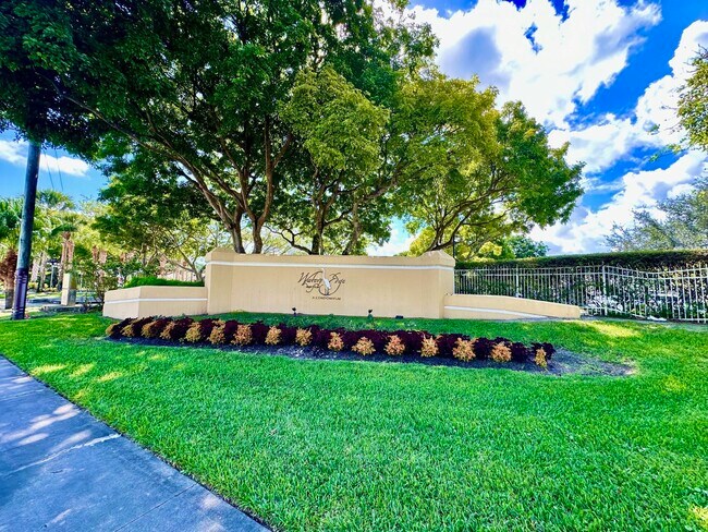 Building Photo - 660 Cypress Club Way Unit C
