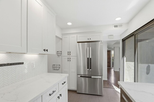 Photo - Beautifully Remodeled 3BD Townhome | Multi-Zone A/C | Private Patio
