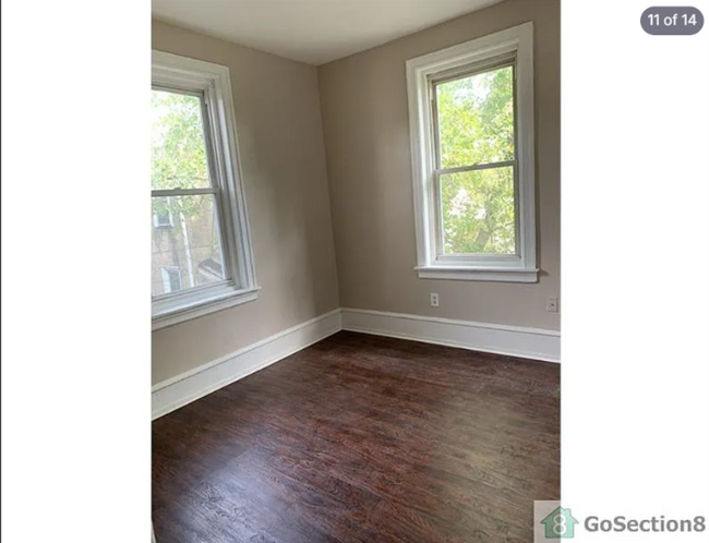 Photo - Spacious 3BR Townhouse with Modern Kitchen  Hardwood Floors  Available Now!