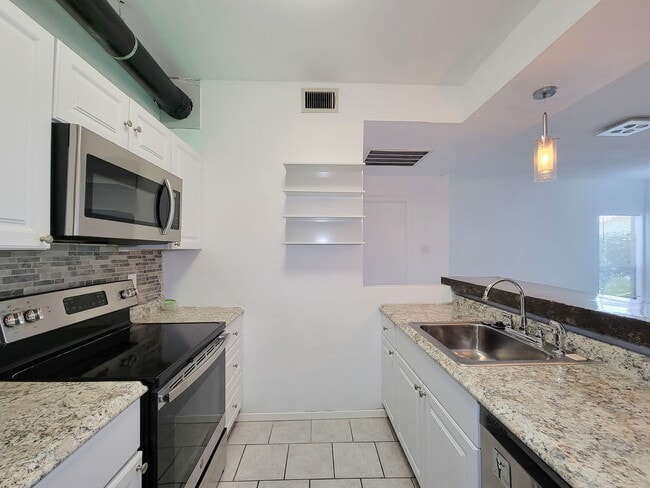 Photo - Spacious one of a kind 2 bedroom 2 bath condo in excellent condition. Entire condo has been paint...