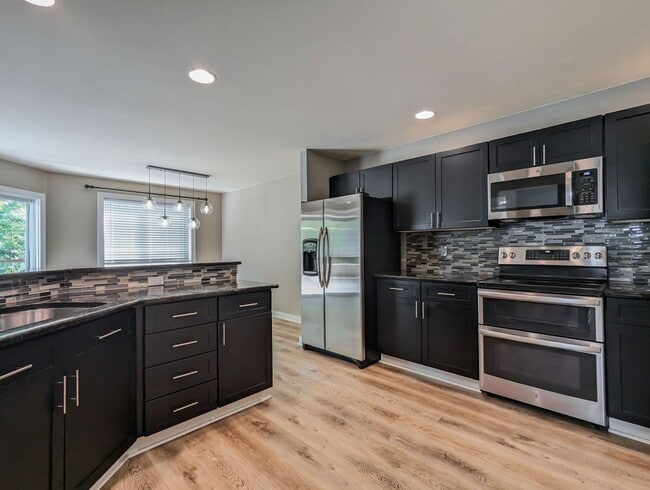 Photo - Beautifully maintained move-in ready 4-bed, 2.5-bath home with upgrades throughout!