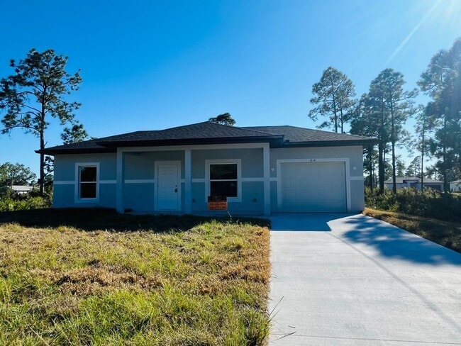 Building Photo - BRAND NEW ONE BEDROOM, ONE BATH-ONE CAR GARAGE- SOUTH LEHIGH ACRES