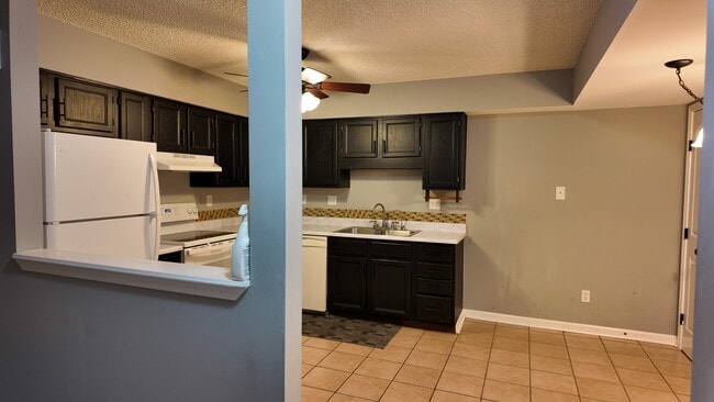 Photo - Spacious 2-Bed Townhome with Finished Basement, Pond View & Attached Garage in Fairfield