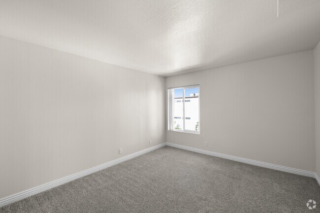 2BR, 2BA - 1,128SF - Primary Bedroom