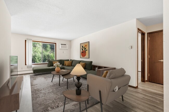 Step into the inviting comfort of Como Park Apartments. Featuring spacious living areas, modern design, and abundant natural light, this home is perfect for relaxation and social gatherings. Don't miss your chance—schedule a tour today!